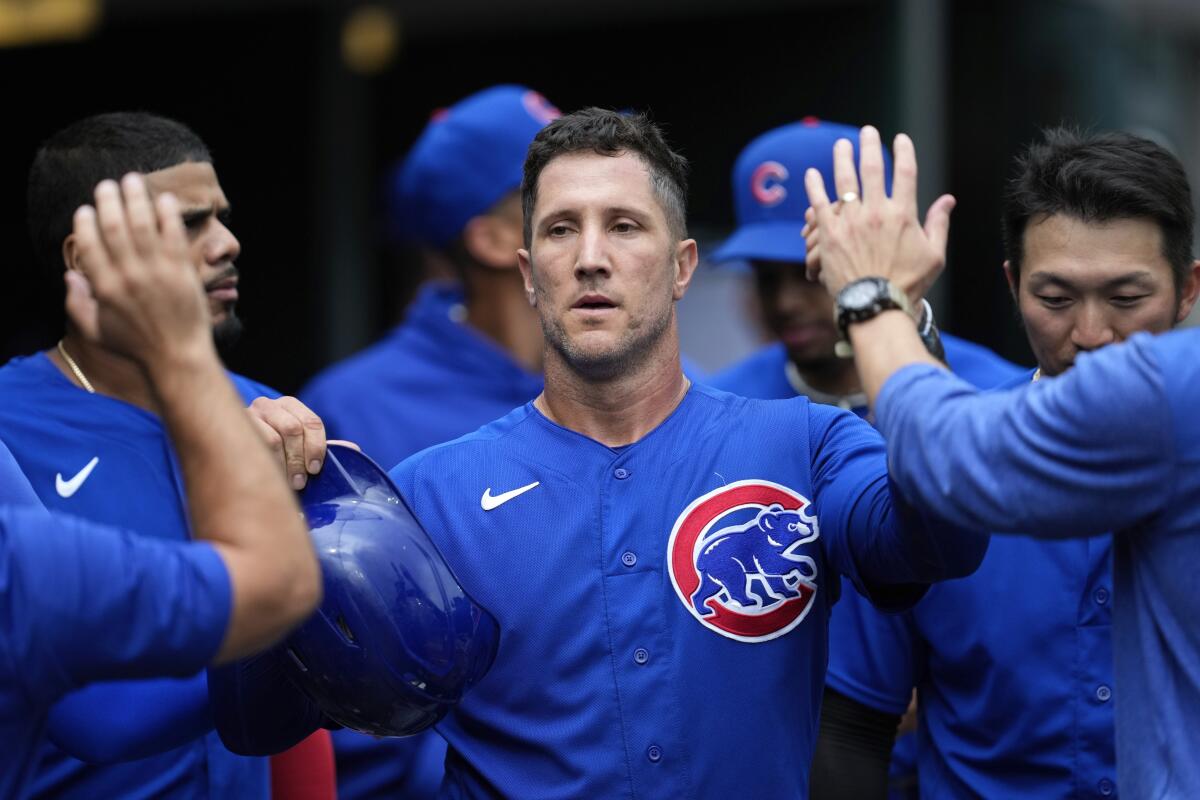 Chicago Cubs catcher Yan Gomes, left, and pitcher Michael Rucker celebrate  the team's 4-0 victory over the Oakland Athletics in a baseball game in  Oakland, Calif., Tuesday, April 18, 2023. (AP Photo/Godofredo