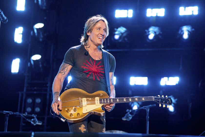 Keith Urban performs during CMA Fest 2022 on Thursday, June 8, 2022, at Nissan Stadium in Nashville, Tenn. (Photo by Amy Harris/Invision/AP)