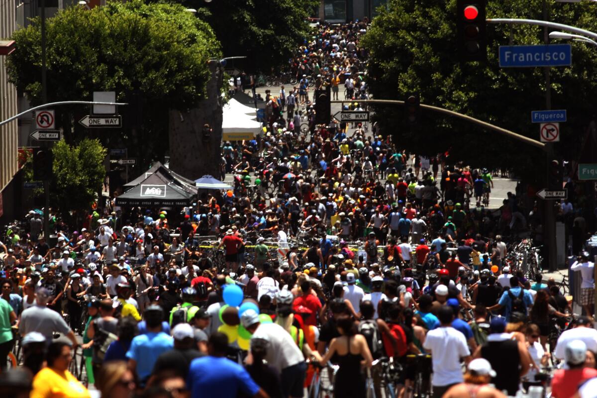 Hundreds take part in a CicLAvia event in downtown L.A. in June 2013.