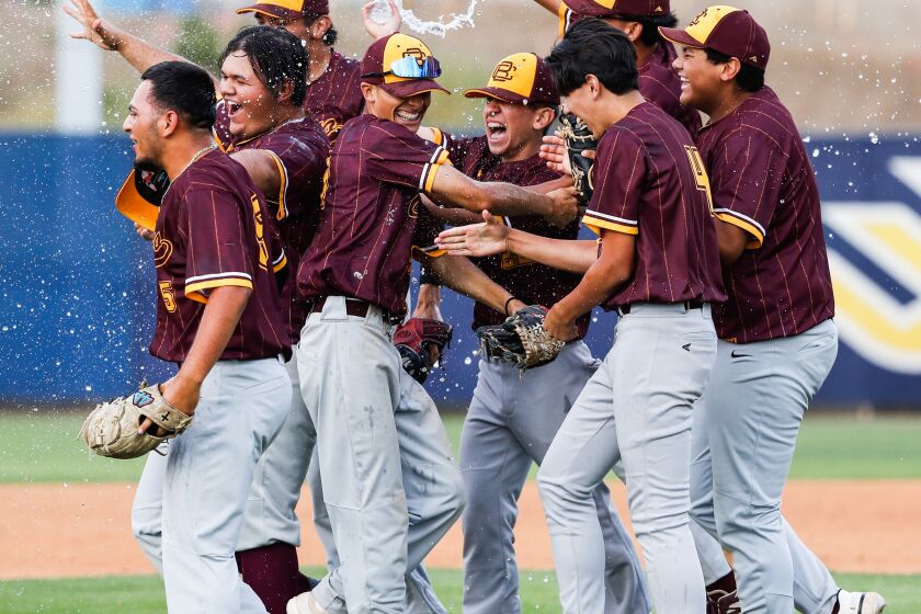 Calexico players celebrate after beating Bishop during the Division IV CIF San Diego Section baseball final at Triton Ballpark on Saturday, May 27, 2023 in San Diego, CA.
