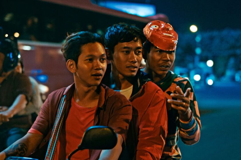 Piseth Chhun, from left, Chinnaro Soem, and Sovann Tho in the movie "White Building."