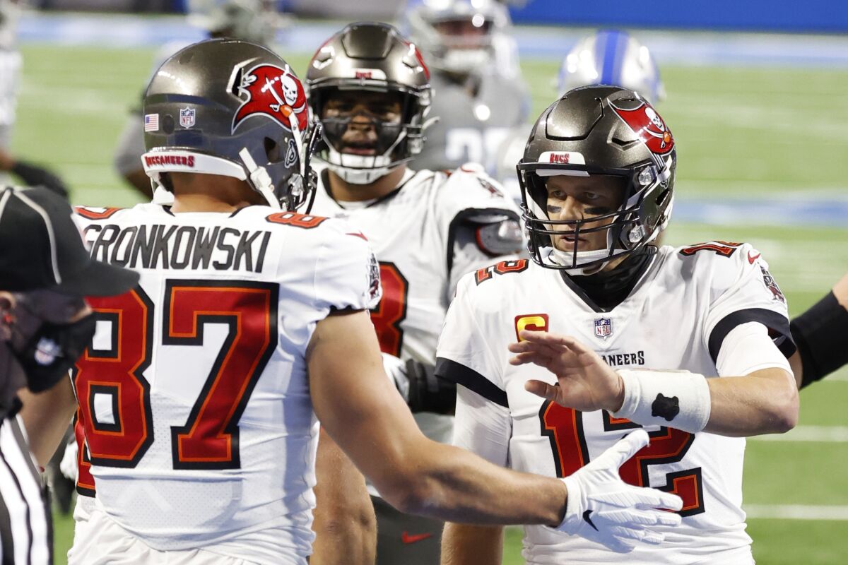 Tampa Bay Buccaneers tight end Rob Gronkowski celebrates with quarterback Tom Brady.
