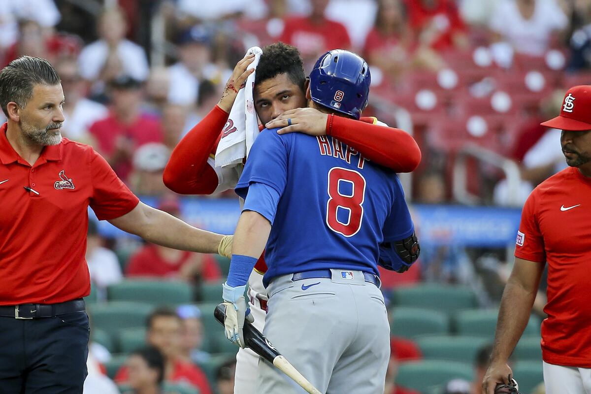 Cubs beat Cardinals 10-3 after a testy start to get back to .500