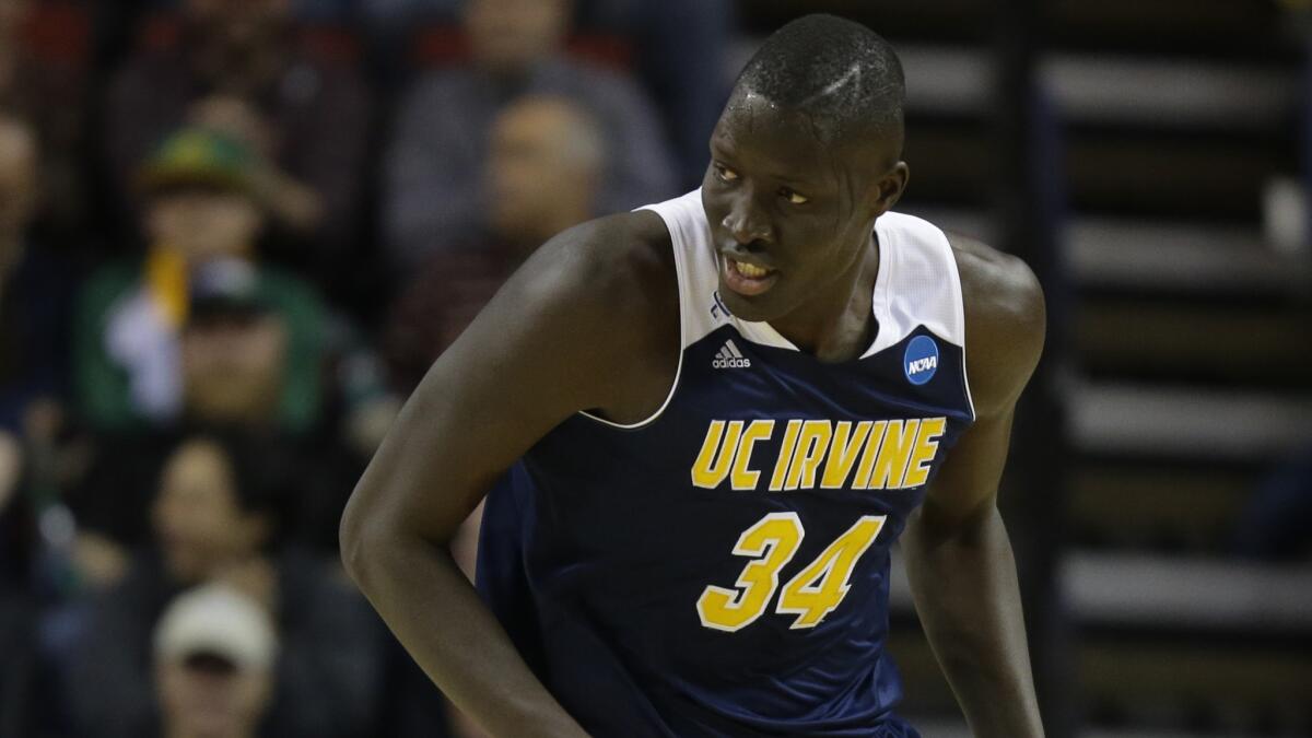 UC Irvine center Mamadou Ndiaye runs up the court during a loss to Louisville in the NCAA tournament on March 20.