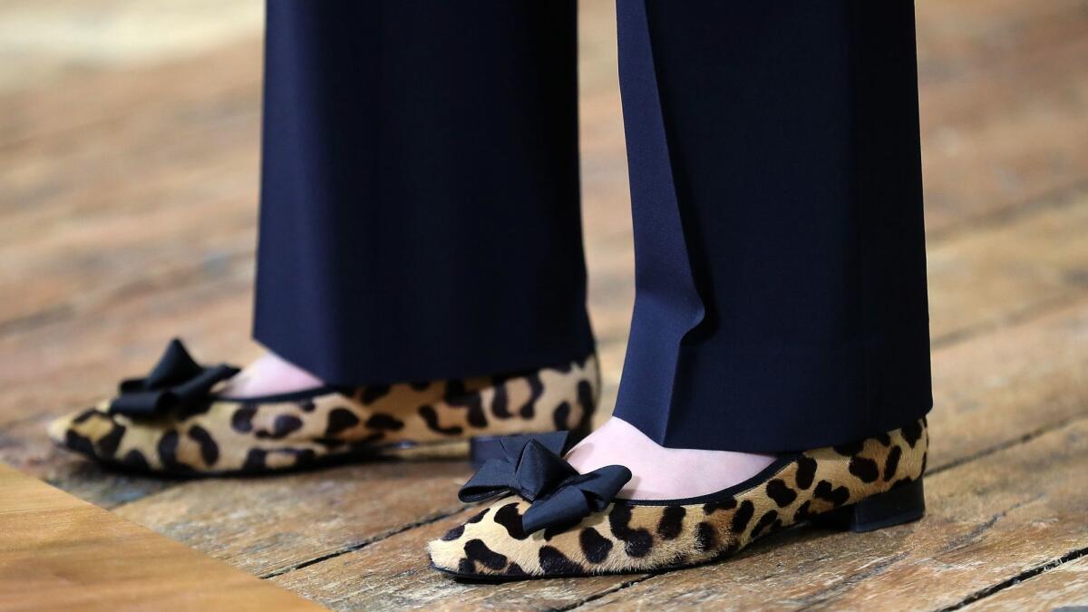 British Prime Minister Theresa May wears flat shoes as she delivers a speech in February.