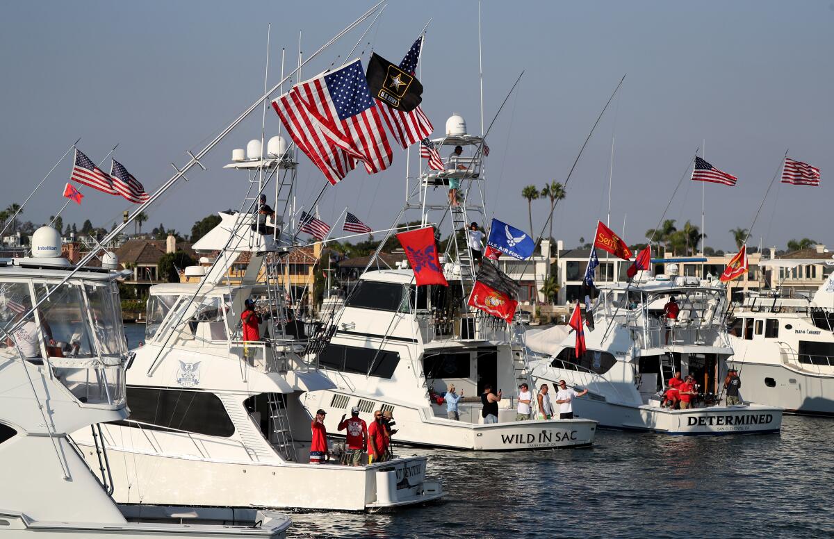 War Heroes on Water Boat Parade participants stand by to start the festivities in Newport Harbor on Thursday.