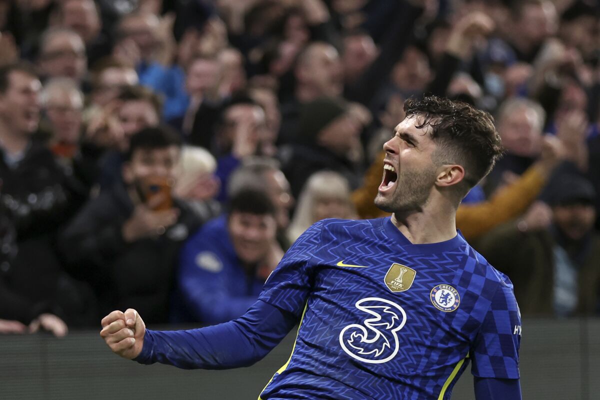 Chelsea's Christian Pulisic celebrates after scoring his side's second goal during the Champions League round of 16, first leg, soccer match between Chelsea and LOSC Lille at Stamford Bridge stadium in London, Tuesday, Feb. 22, 2022. (AP Photo/Ian Walton)