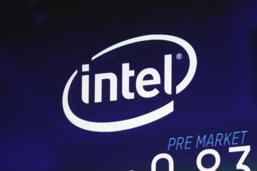 FILE - The Intel logo appears on a screen at the Nasdaq MarketSite, in New York's Times Square, on Oct. 3, 2018. European Union antitrust enforcers slapped Intel on Friday, Sept. 22, 2023, with a fresh $400 million fine in a long-running legal fight that the chipmaker appeared to have won last year, in a postscript to a case that dates back more than a decade. (AP Photo/Richard Drew, File)