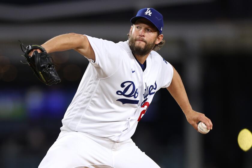 LOS ANGELES, CALIFORNIA - APRIL 01: Clayton Kershaw #22 of the Los Angeles Dodgers pitches.