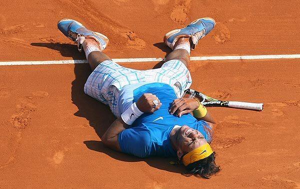 Rafael Nadal of Spain reacts after defeating Fernando Verdasco of Spain for Nadal's sixth consecutive Monte Carlo Tennis Masters tournament title.