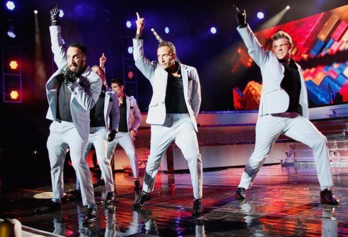 The Backstreet Boy -- from left, A.J. McClean, Brian Littrell, Kevin Richardson, Howie Dorough and Nick Carter -- perform Tuesday in Wantagh, N.Y. They're on tap for Macy's Passport Presents Glamorama.