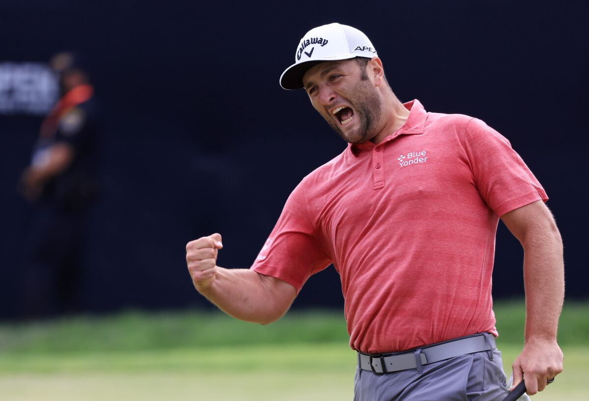 Jon Rahm celebrates making a putt for birdie on the 18th green during the final round of the U.S. Open at Torrey Pines.