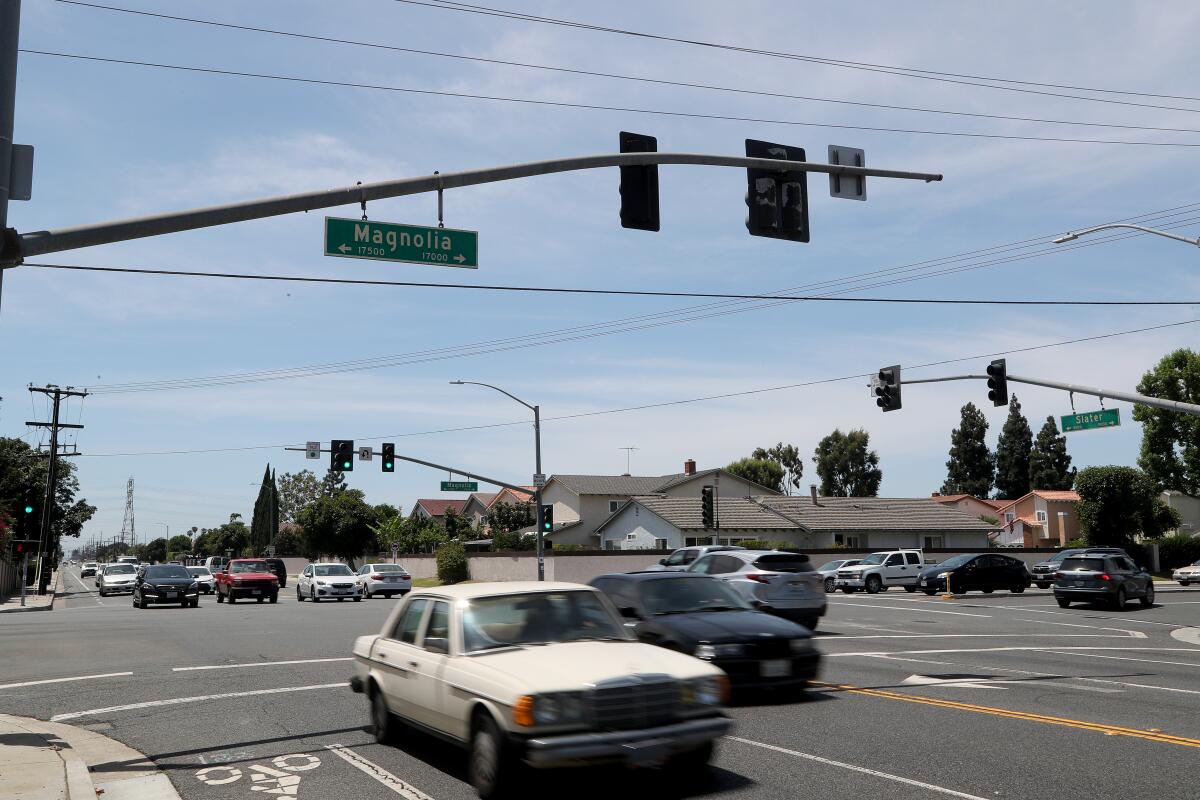 Traffic moves through the intersection at Magnolia Street and Slater Avenue on Thursday.