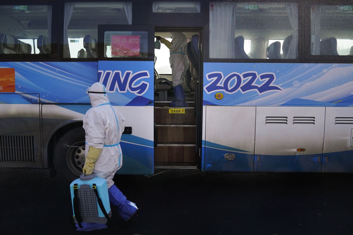 Olympic shuttle bus being disinfected in China