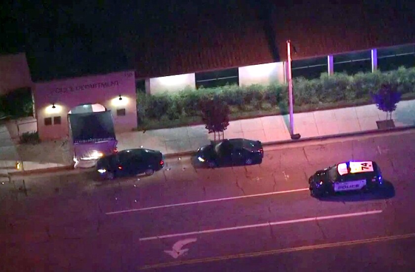 Authorities respond to a shooting outside the La Habra Police Department.