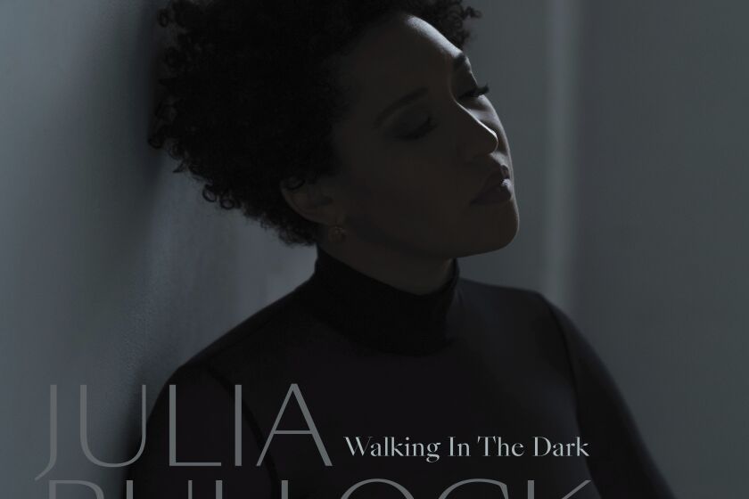 This cover image released by Nonesuch shows "Walking in the Dark" by Julia Bullock. (Nonesuch via AP)