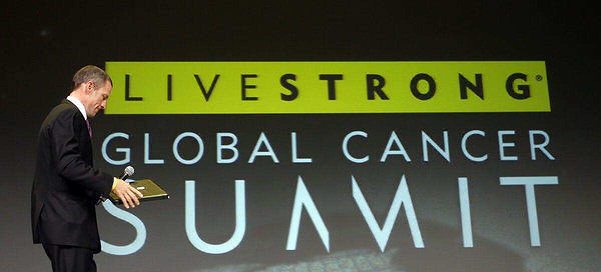 Lance Armstrong arrives to open the Livestrong Global Cancer Summit in Dublin, Ireland.