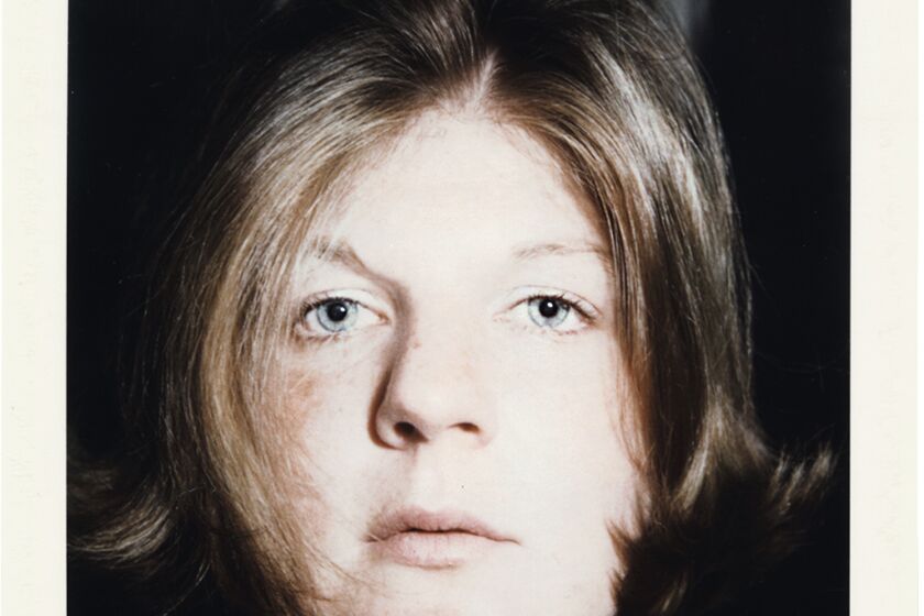 Brigid Berlin looks contemplative in a Polaroid self-portrait