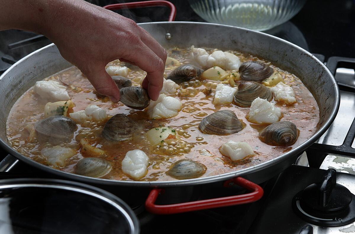 Seafood paella may look difficult to make, but it couldn't be simpler.