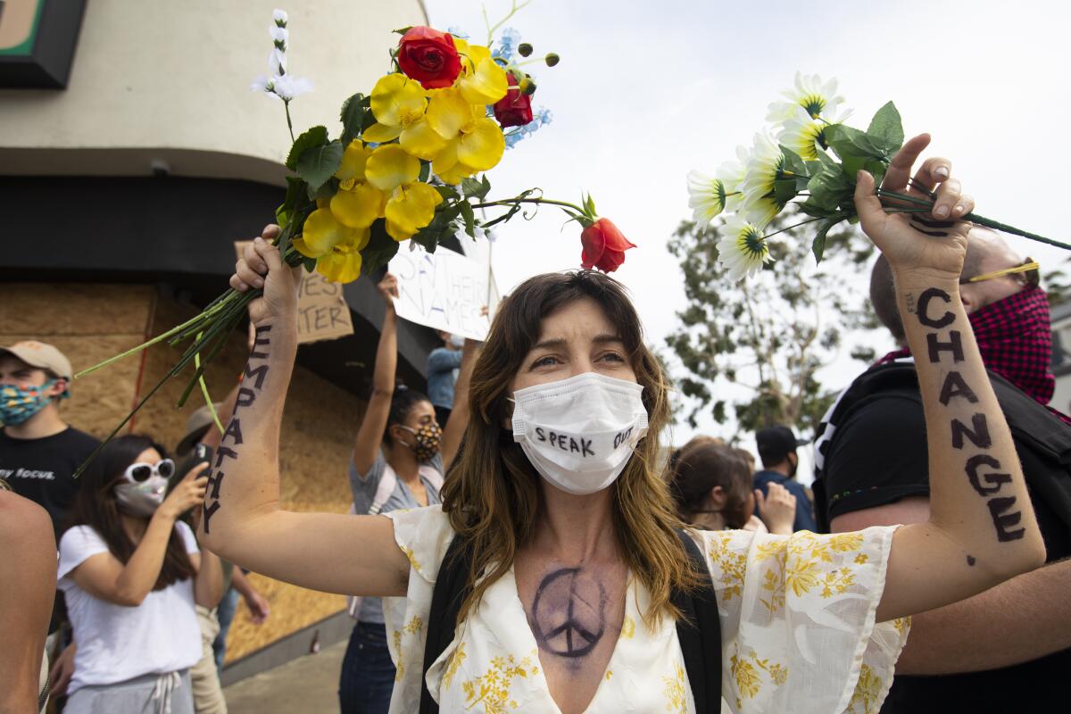 Protests continue against police brutality and racial discrimination in Hollywood on Monday.