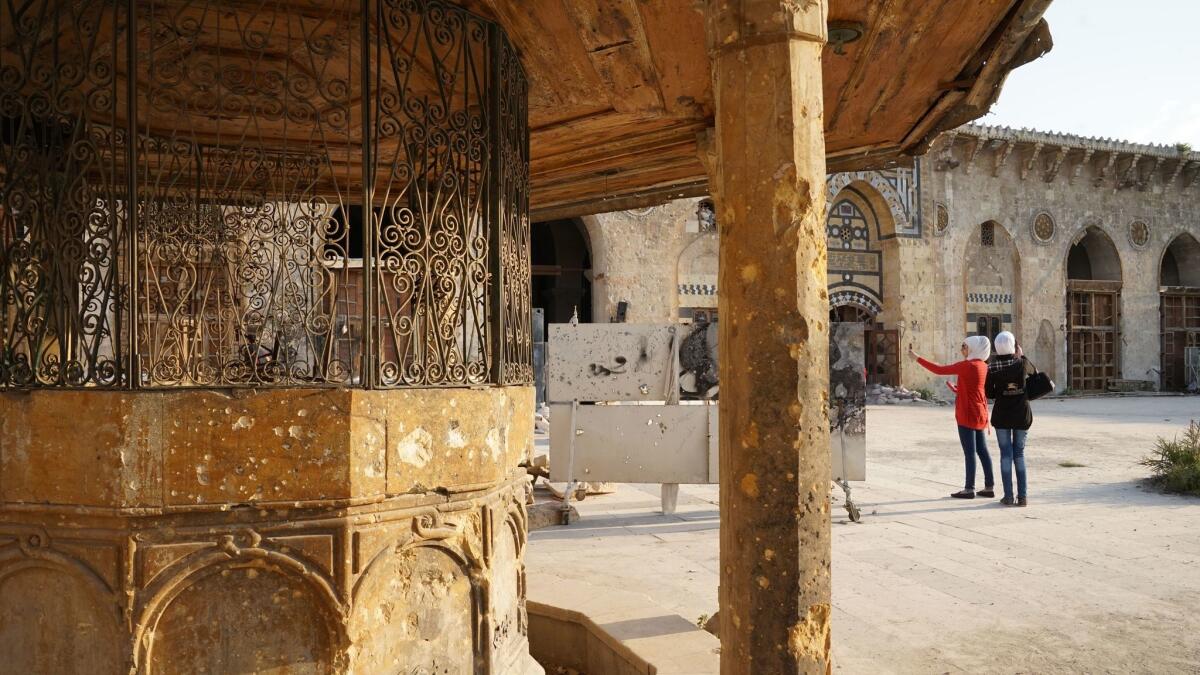 A washing or ablution fountain erected centuries ago in the mosque complex's plaza is among the structures damaged in the civil war.