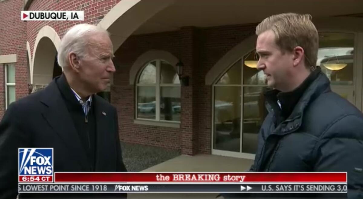 Presumptive Democratic presidential nominee Joe Biden, left, with Fox News reporter Peter Doocy in Dubuque, Iowa, in 2019.