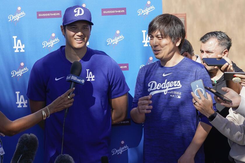 Dodgers star Shohei Ohtani and his translator Ippei Mizuhara addresses the media on Feb. 29 at Camelback Ranch  