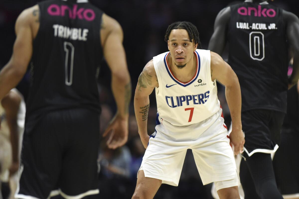 Clippers guard Amir Coffey takes part in an exhibition game.