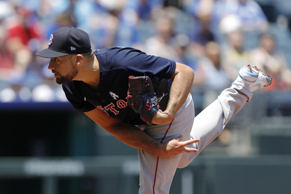 Boston Red Sox pitcher Nathan Eovaldi pitches against the Kansas City Royals.