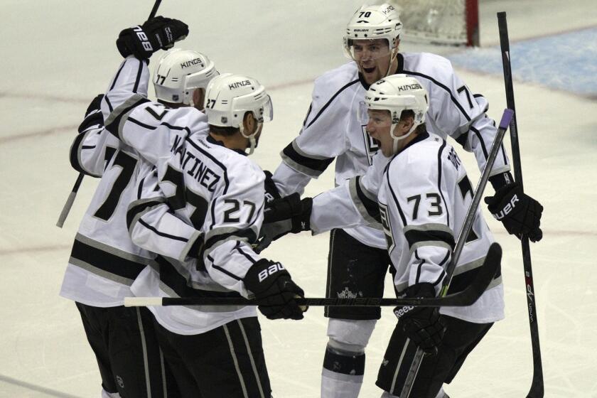 Kings celebrate a first-period goal by defenseman Alec Martinez against the Ducks during Game 2 of the Western Conference semifinals at Honda Center. The Kings won the game, 3-1, to take a 2-0 series lead.