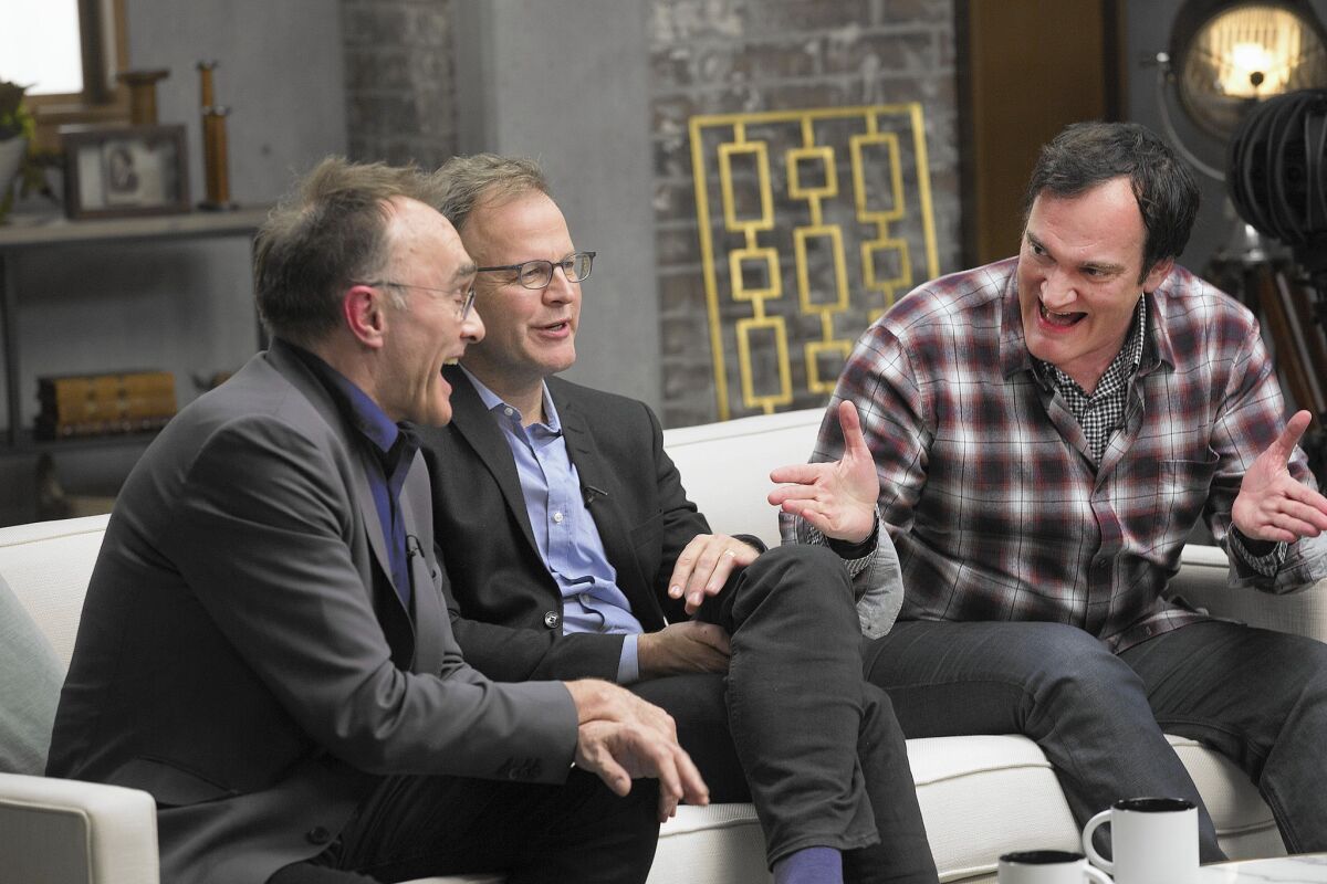Danny Boyle, left, Tom McCarthy and Quentin Tarantino converse. "Especially an acting scene, I want a perfect take before ... I move on, one take from beginning to end," Tarantino said during the discussion.