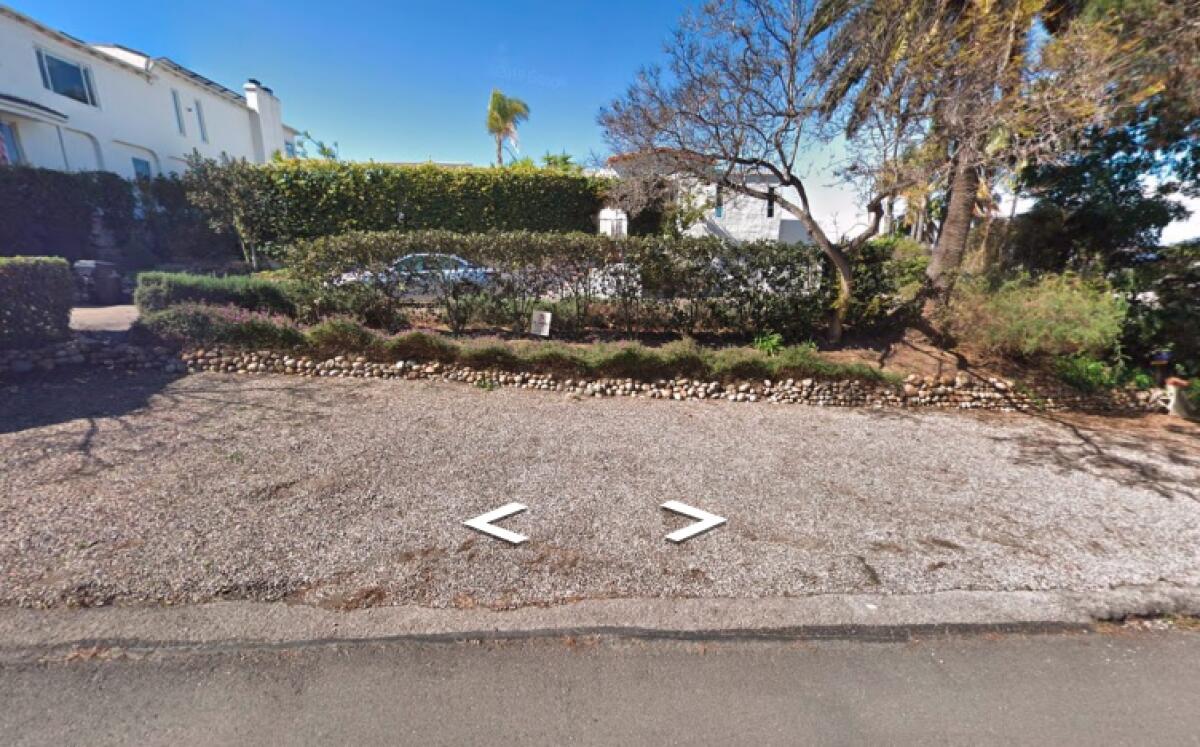 Ron Greenspan writes that this is what the parking area in front of his Little Street home looked like before he moved in.