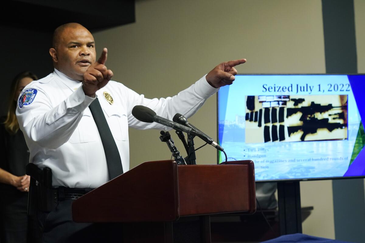 Richmond Police Chief Gerald M Smith gestures during a press conference at Richmond Virginia Police headquarters, Wednesday July 6, 2022, in Richmond, Va. Police said Wednesday that they thwarted a planned July 4 mass shooting after receiving a tip that led to arrests and the seizure of multiple guns — an announcement that came just two days after a deadly mass shooting on the holiday in a Chicago suburb.. (AP Photo/Steve Helber)