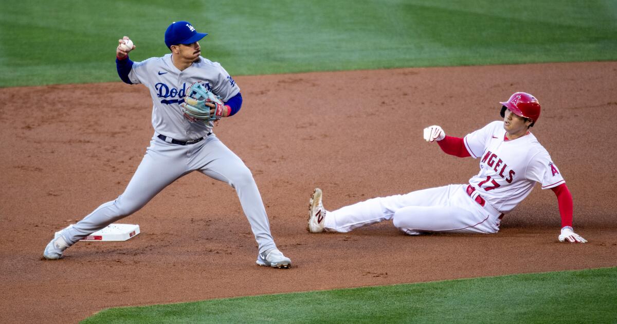 Los Angeles, United States. 08th Aug, 2021. Los Angeles Angels pitcher  Shohei Ohtani looks on from the dugout during their game with the Los  Angeles Dodgers at Dodger Stadium in Los Angeles