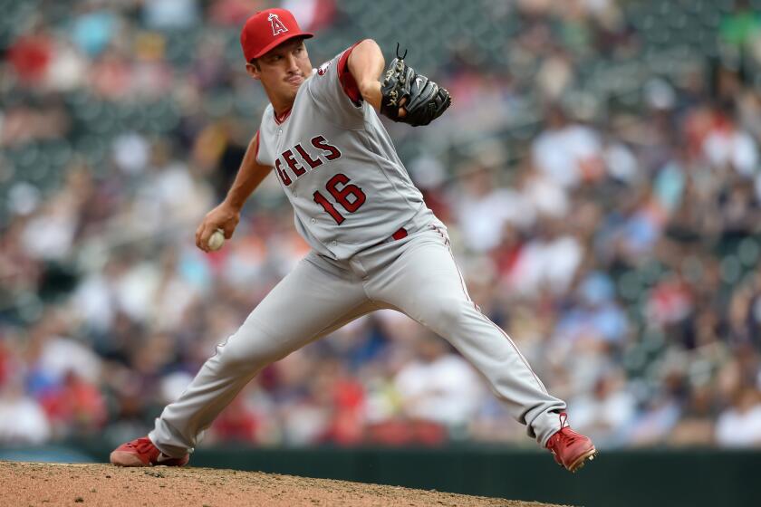 Angels closer Huston Street delivers a pitch against the Twins during the twelfth inning of a game on Apr. 17.