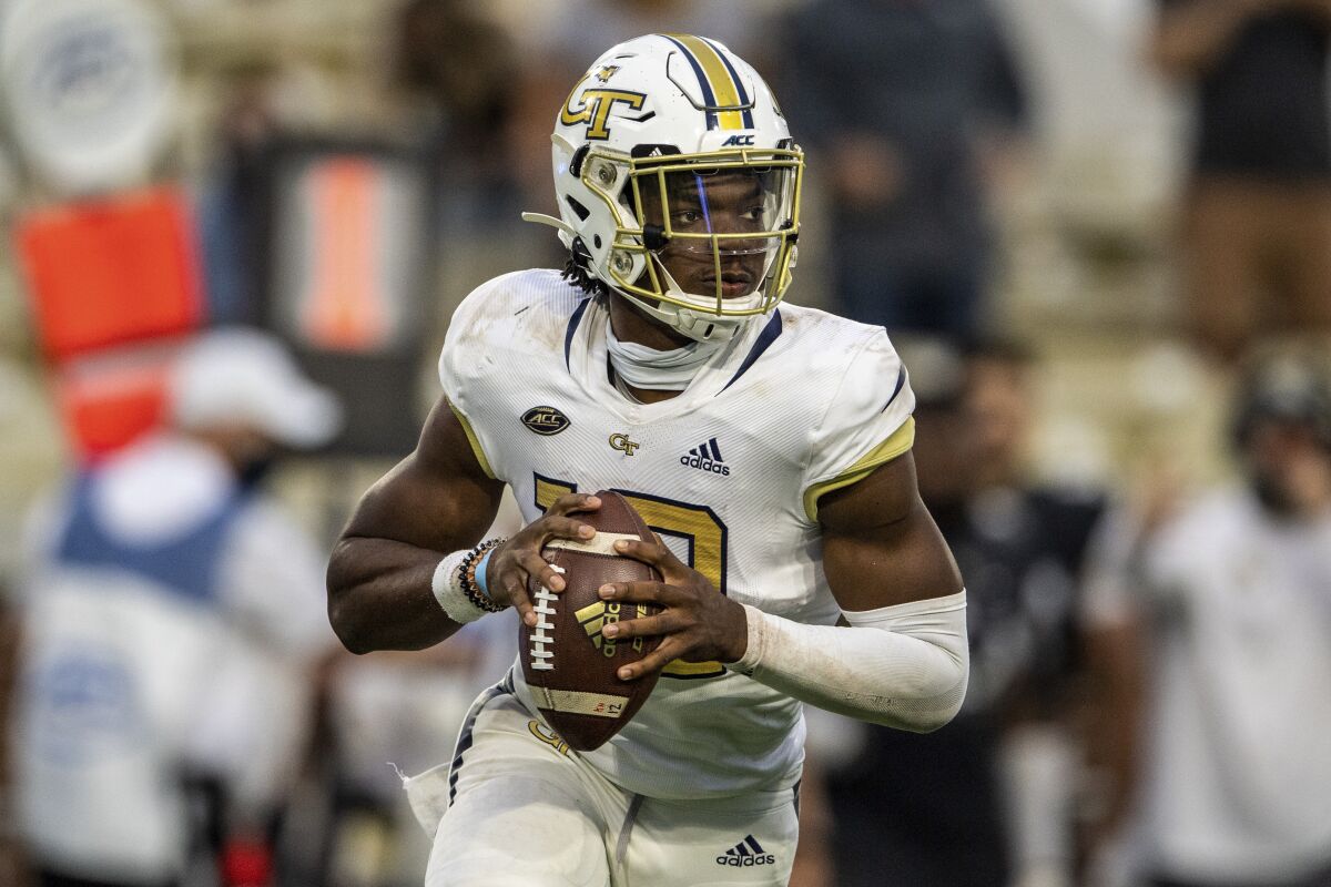 FILE - In this Saturday, Sept 19, 2020, file photo, Georgia Tech quarterback Jeff Sims (10) looks to pass against UCF during an NCAA college football game in Atlanta. Pitt's fierce pass rush will be a new test for Sims' ability to remain poised in the pocket on Saturday night. (AP Photo/Danny Karnik, File)