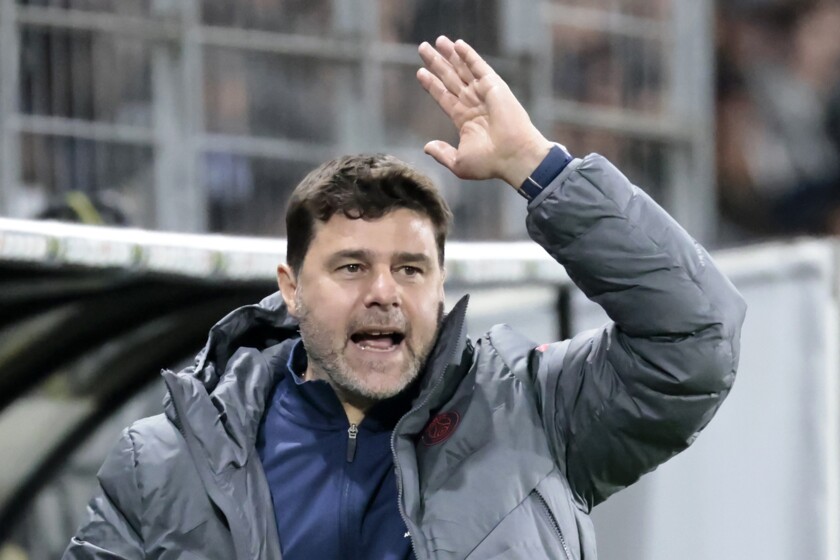 FILE - PSG's head coach Mauricio Pochettino gestures during the League One soccer match between Angers and Paris Saint Germain, at the Raymond-Kopa stadium in Angers, western France, Wednesday, April 20, 2022. Paris Saint-Germain coach Mauricio Pochettino has been sacked with Christophe Galtier expected to be confirmed as the new coach on Tuesday July 5, 2022. Pochettino had one year left on his contract and is the fourth straight coach to be fired by PSG. (AP Photo/Jeremias Gonzalez, File)