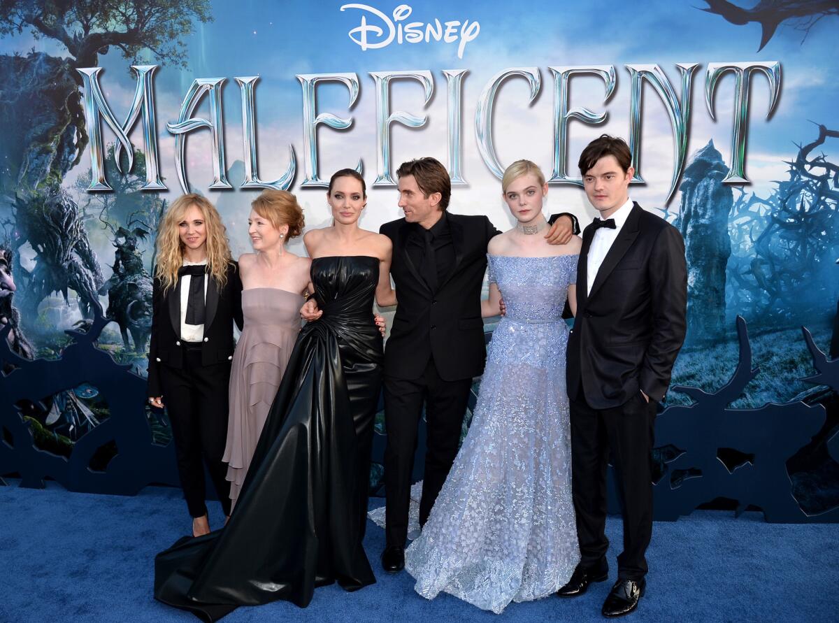 Actors Juno Temple, Lesley Manville, Angelina Jolie, Sharlto Copley, Elle Fanning and Sam Riley attend the premiere of "Maleficent" at the El Capitan Theatre in Hollywood.