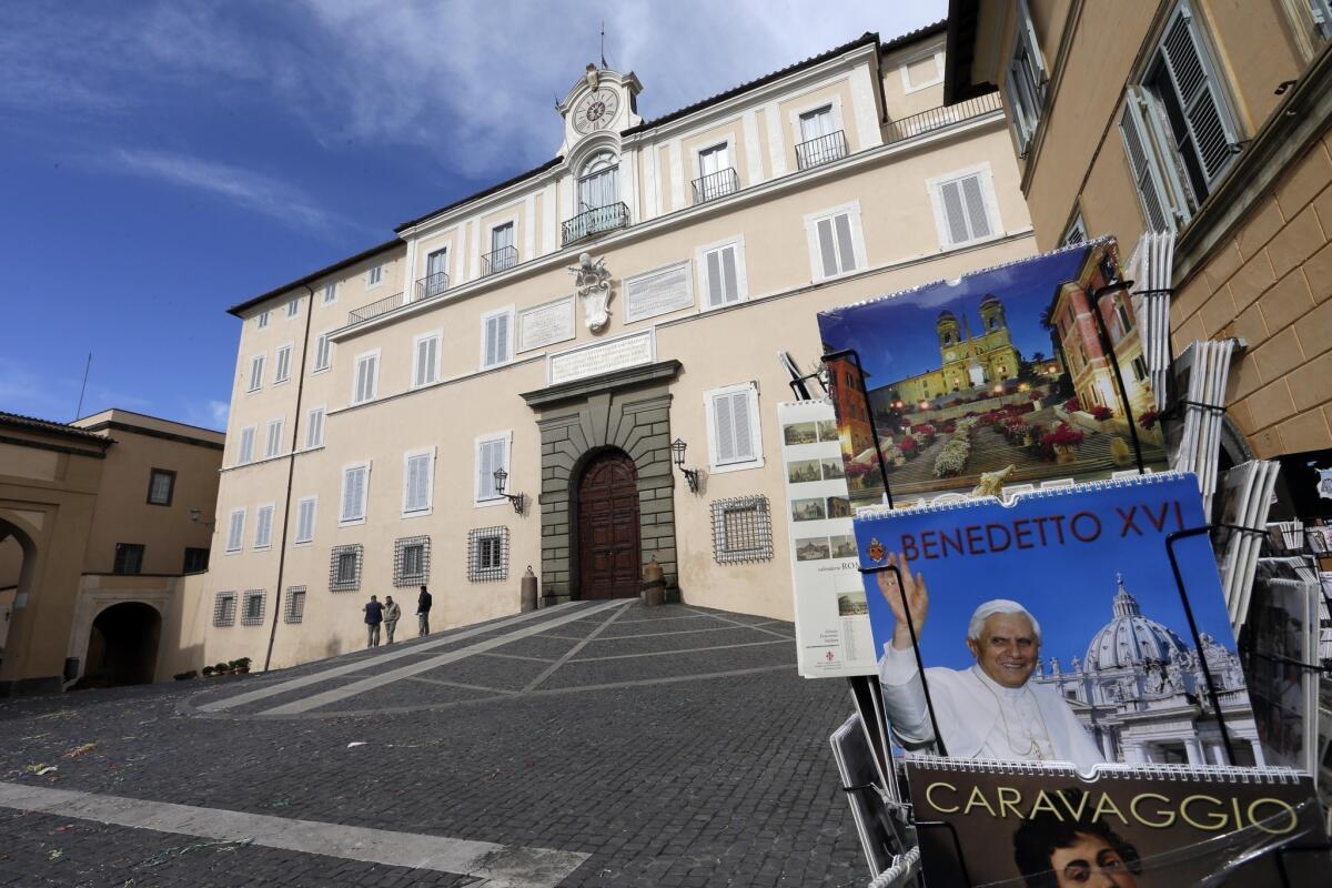 Photo calendars of Pope Benedict XVI are sold outside the pope's summer residence of Castel Gandolfo, south of Rome, where Benedict will temporarily move after he steps down on Feb. 28 while permanent lodgings are prepared at the Vatican.