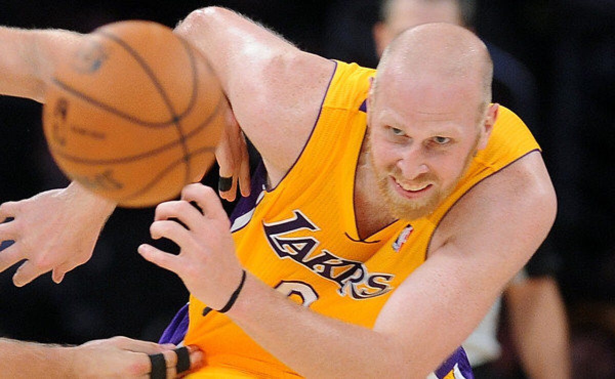Lakers center Chris Kaman chases after a loose ball during a game against the New Orleans Pelicans last month.