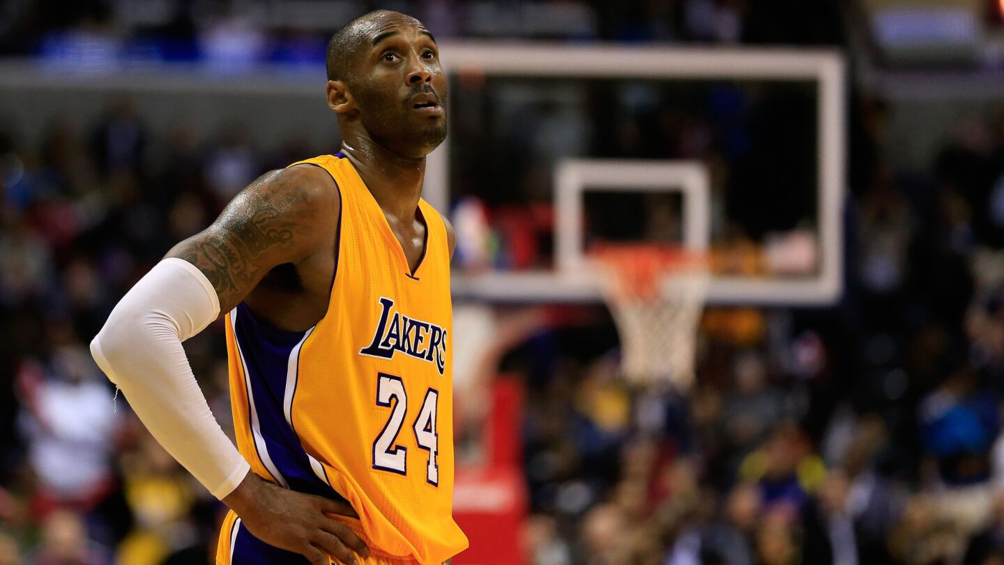 Lakers star Kobe Bryant looks on during the closing moments of a 111-95 loss to the Washington Wizards on Dec. 3, 2014.