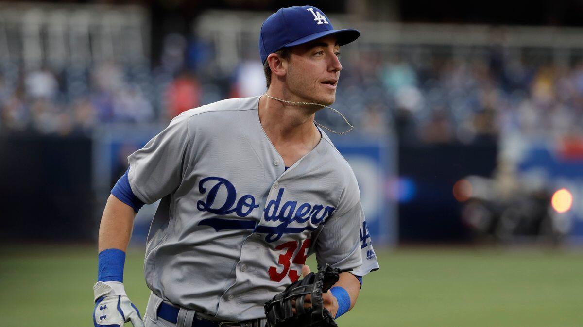 Dodgers left fielder Cody Bellinger warms up before a game against the San Diego Padres Friday.