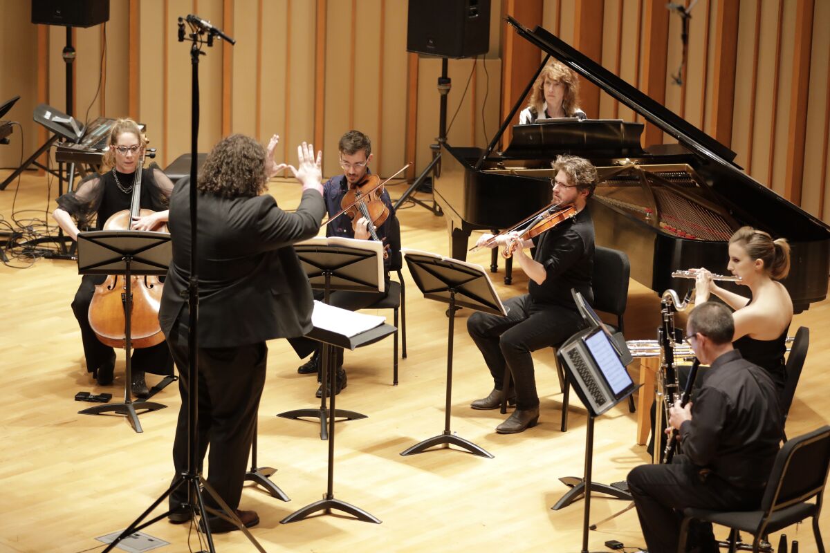 Pianist Vicki Ray with, from left, cellist Ashley Walters, violist Andrew McIntosh, violinist Andrew Tholl, flutist Rachel Beetz and clarinetist Brian Walsh play Gerard Grisey’s "Vortex Temporum," with Nicholas Deyoe conducting Tuesday at Zipper Hall. 