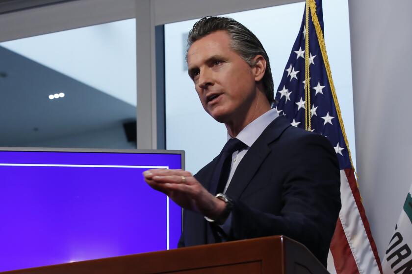 FILE— In this Tuesday April 14, 2020, file photo, California Gov. Gavin Newsom discusses an outline for what it will take to lift coronavirus restrictions, during a news conference at the Governor's Office of Emergency Services in Rancho Cordova, Calif. Newsom says the state will have thousands of workers to track down everyone who may be infected by each person who contracts coronavirus. Newsom said Monday, May 4, 2020, that counties will have to show they can perform so-called contact tracing as a prerequisite to reopening businesses. (AP Photo/Rich Pedroncelli, File)