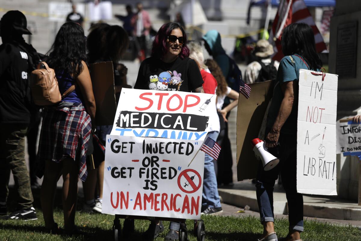 A protester with a sign in Los Angeles