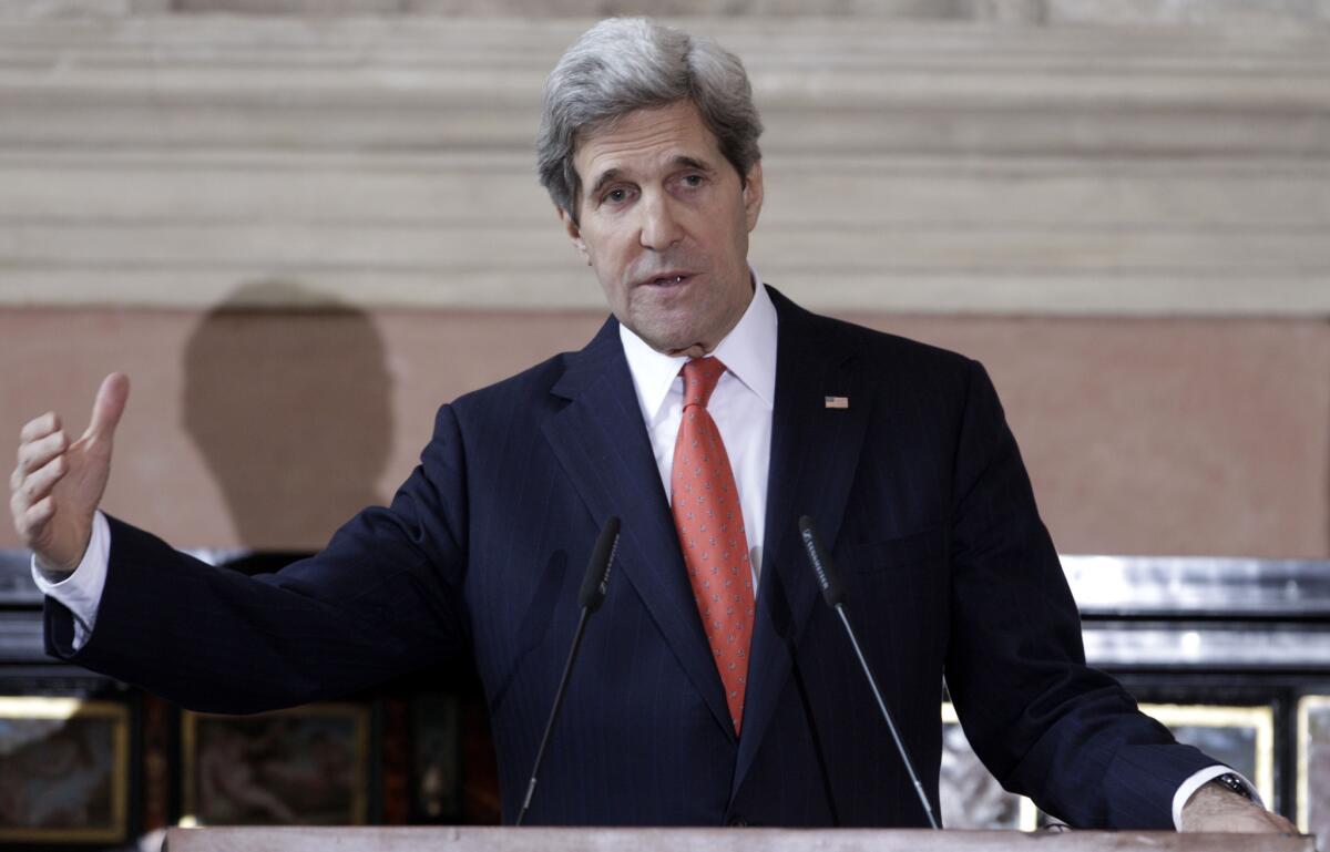 Secretary of State John Kerry gives a statement during a press conference following an international conference on Syria at Villa Madama, Rome.