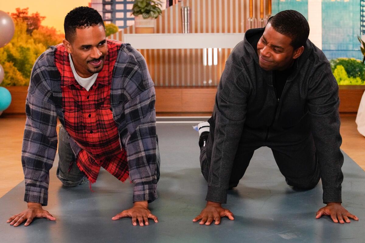 Damon Wayans Jr., left, and Kenan Thompson on their hands and knees.
