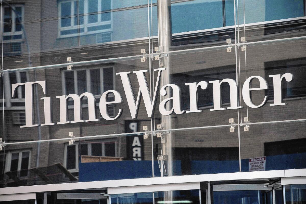 Time Warner board members Monday amended the company’s bylaws to make it more difficult for Rupert Murdoch's 21st Century Fox to mount a hostile takeover. Above, the firm's headquarters in New York City.