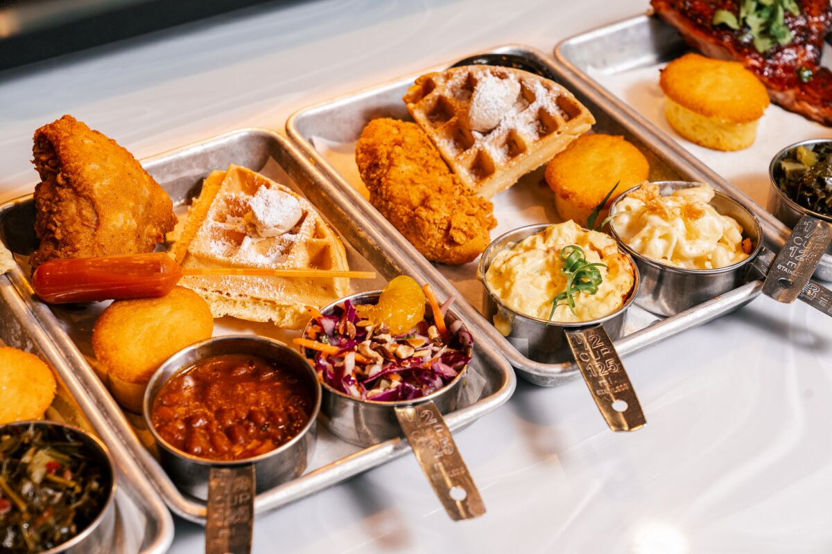Pork & Waffle station with spicy fried chicken and waffle and sides