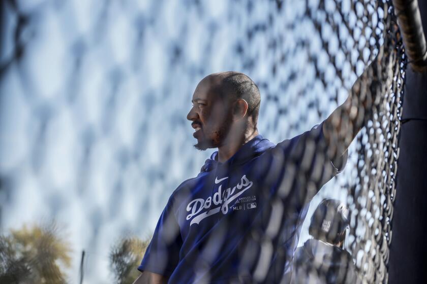 Goodyear, Arizona, Thursday, February 15, 2024 - Dodgers star player Mookie Betts looks out to the practice field during day two of spring training at Camelback Ranch. (Robert Gauthier/Los Angeles Times)